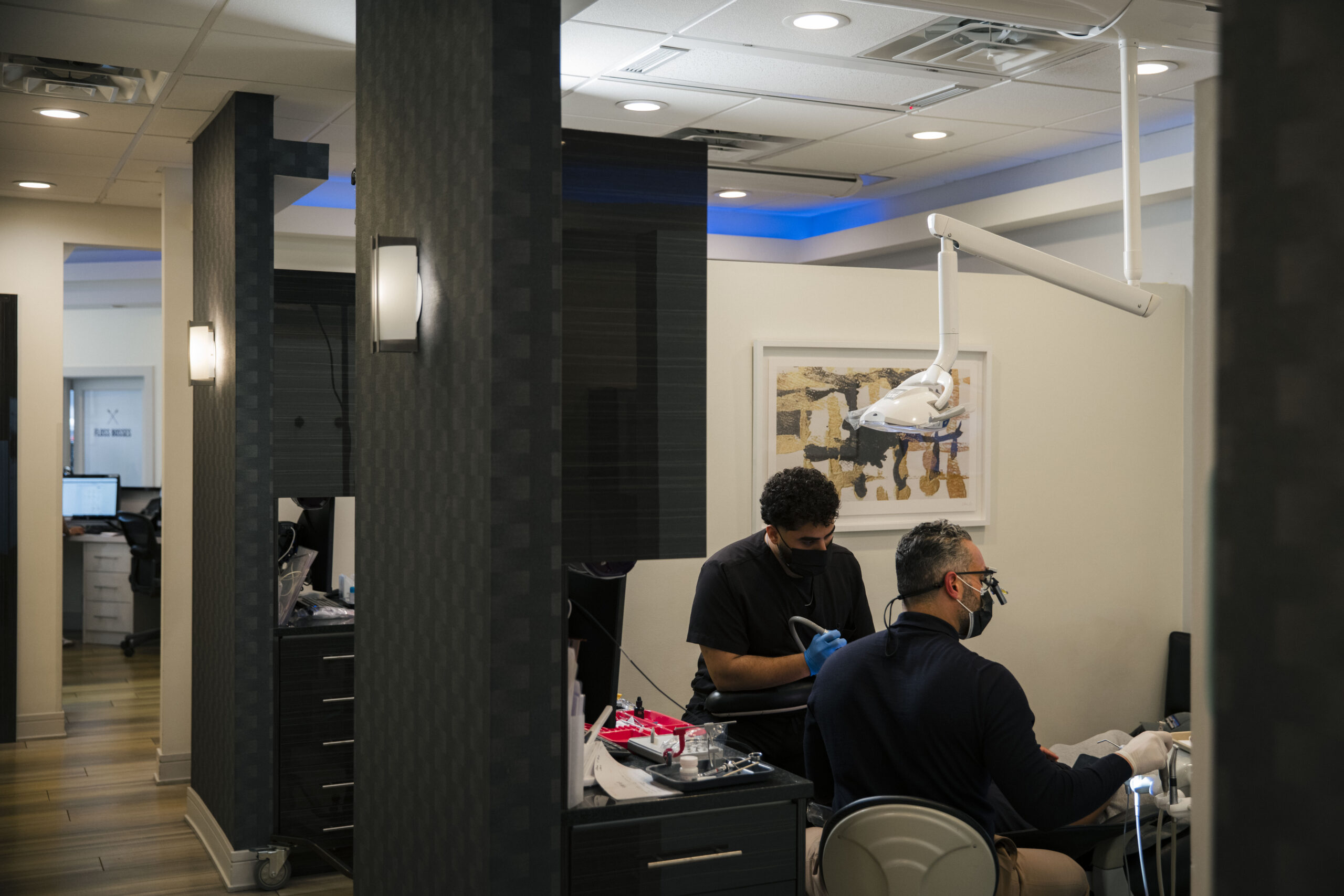 The Holistic Airway Dentist treatment room with dentist examining patient