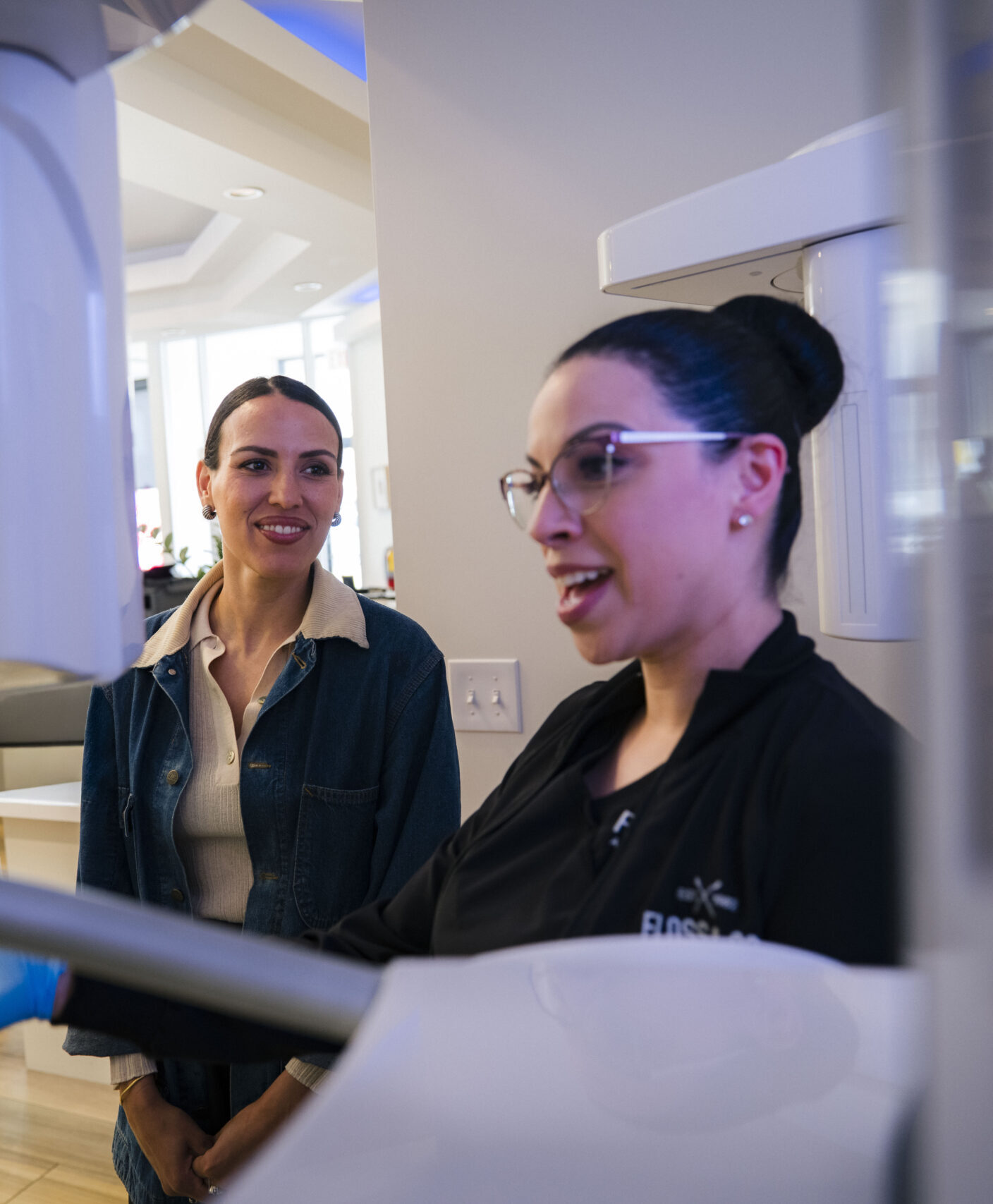 Dental professionals discuss treatment in The Holistic Airway Dentist office
